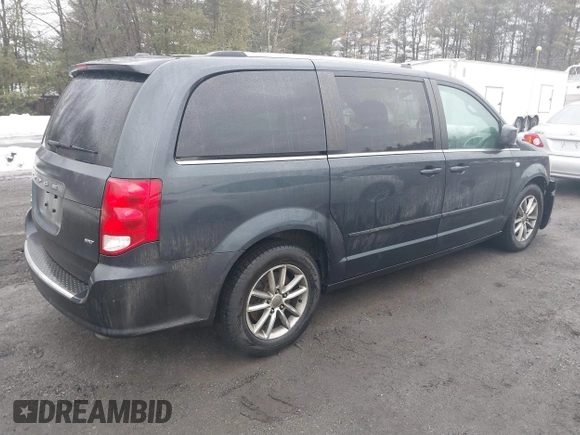 2014 Dodge Grand Caravan SXT with VIN 2C4RDGCG2ER463395, listed as a IAAI auction lot 41709948 with 137,783 mi miles and . Bid and sale history available at DreamBid. Image 4.