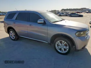 2013 Dodge Durango SXT z VIN 1C4RDHAGXDC697865, wystawiony jako Copart lot #52635305 z przebiegiem 206 980 mil mil oraz Czysty tytuł • Clean title. Historia ofert i sprzedaży dostępna na DreamBid. Obrazek 4.