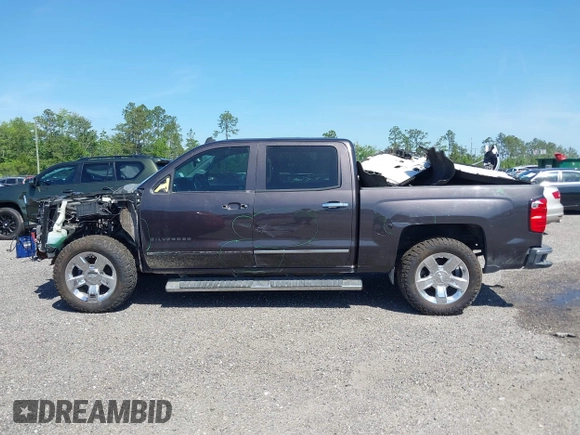 2014 Chevrolet Silverado 1500 LTZ with VIN 3GCUKSEC8EG536076, listed as a IAAI auction lot 41464408 with 133,418 mi miles and . Bid and sale history available at DreamBid. Image 14.