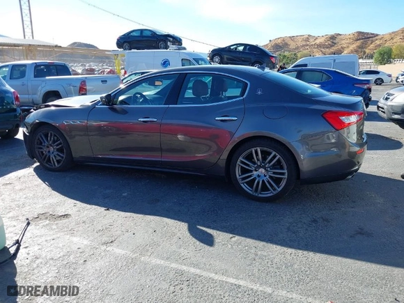 2016 Maserati Ghibli with VIN ZAM57XSA8G1176410, listed as a IAAI auction lot 41180917 with NaN miles. Bid and sale history available at carsss.com. Image 14.