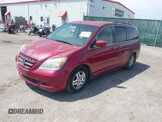 2006 Honda Odyssey EX with VIN 5FNRL38456B113072, listed as a IAAI auction lot 42112693 with 238,883 mi miles. Bid and sale history available at carsss.com. Image 2.