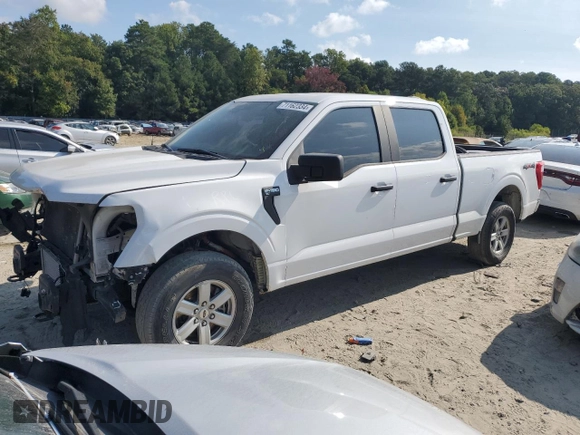 2021 Ford F-150 XL with VIN 1FTFW1E82MKD23506, listed as a Copart auction lot 71162334 with 71,387 mi miles and Salvage Title. Bid and sale history available at carsss.com. Image 1.