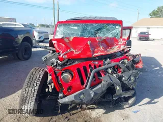2015 Jeep Wrangler Unlimited Sport with VIN 1C4BJWDG4FL694005, listed as a IAAI auction lot 41971529 with Not provided miles and . Bid and sale history available at DreamBid. Image 12.