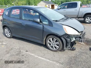 2011 Honda Fit Sport z VIN JHMGE8H59BS007887, wystawiony jako IAAI lot #42352068 z przebiegiem 192 662 mil mil oraz . Historia ofert i sprzedaży dostępna na DreamBid. Obrazek 1.