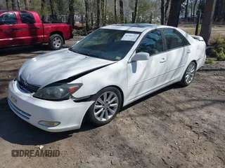 2003 Toyota Camry LE z VIN JTDBF30K930147772, wystawiony jako IAAI lot #41768713 z przebiegiem 231 537 mil mil oraz . Historia ofert i sprzedaży dostępna na DreamBid. Obrazek 2.
