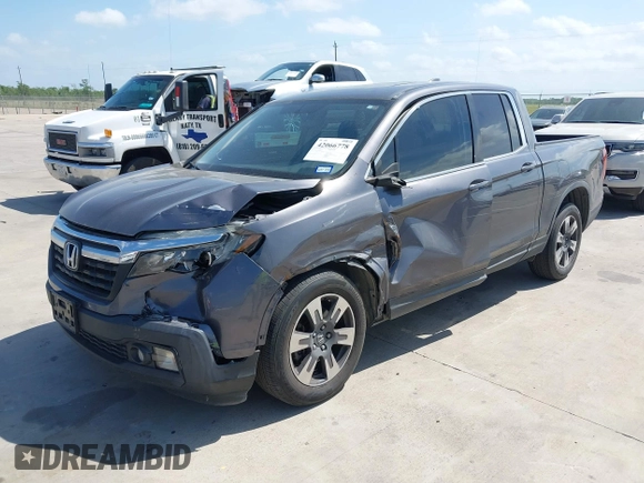 2019 Honda Ridgeline RTL with VIN 5FPYK2F59KB004653, listed as a IAAI auction lot 42066778 with 90,144 mi miles and . Bid and sale history available at DreamBid. Image 17.