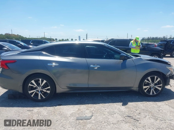2016 Nissan Maxima SL with VIN 1N4AA6AP9GC901494, listed as a IAAI auction lot 42023106 with 160,581 mi miles and . Bid and sale history available at DreamBid. Image 14.