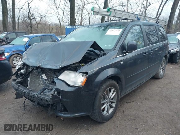 2014 Dodge Grand Caravan SXT with VIN 2C4RDGCG8ER257837, listed as a IAAI auction lot 41211629 with 139,231 mi miles and . Bid and sale history available at DreamBid. Image 6.