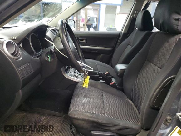2008 Suzuki Grand Vitara w/Spare & Cargo Covers z VIN JS3TD941484100374, wystawiony jako Copart lot #44193825 z przebiegiem 187 674 mil mil oraz Szkoda całkowita • Salvage title. Historia ofert i sprzedaży dostępna na DreamBid. Obrazek 7.