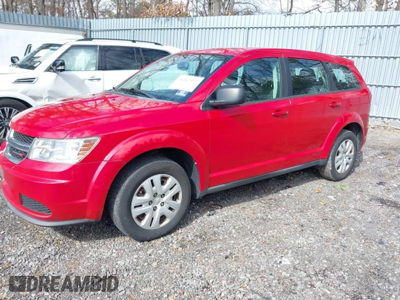 2013 Dodge Journey SE with VIN 3C4PDCABXDT721228, listed as a IAAI auction lot 41662172 with 311,815 mi miles. Bid and sale history available at carsss.com. Image 2.