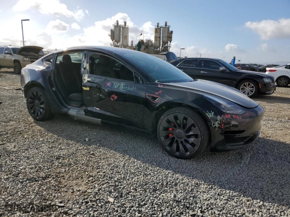 2022 Tesla Model 3 Performance with VIN 5YJ3E1EC9NF130911, listed as a Copart auction lot 50942735 with 30,484 mi miles and Salvage Title. Bid and sale history available at carsss.com. Image 4.