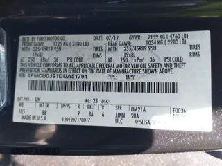 2013 Ford Escape Titanium with VIN 1FMCU0J91DUA51791, listed as a IAAI auction lot 39066929 with 193,451 mi miles. Bid and sale history available at carsss.com. Image 9.