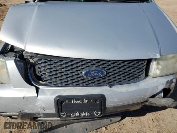 2005 Ford Freestyle SEL z VIN 1FMDK02135GA10159, wystawiony jako Copart lot #72774784 z przebiegiem 146 096 mil mil oraz Szkoda całkowita • Salvage title. Historia ofert i sprzedaży dostępna na DreamBid. Obrazek 12.