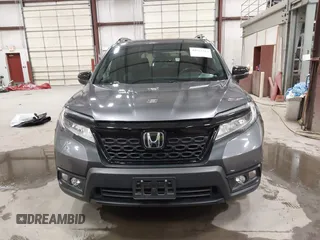 2019 Honda Passport Touring with VIN 5FNYF8H98KB007933, listed as a IAAI auction lot 41953263 with 87,614 mi miles and . Bid and sale history available at DreamBid. Image 12.