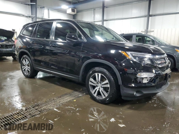2016 Honda Pilot EX-L with VIN 5FNYF6H54GB056149, listed as a Copart auction lot 52232145 with 168,925 mi miles and Salvage Title. Bid and sale history available at carsss.com. Image 4.
