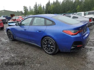 2023 BMW i4 M50 with VIN WBY33AW07PFN69788, listed as a Copart auction lot 54684024 with 14,193 mi miles. Bid and sale history available at carsss.com. Image 2.