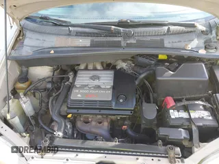 2002 Toyota Sienna LE with VIN 4T3ZF13C82U457803, listed as a IAAI auction lot 41198246 with 185,445 mi miles and . Bid and sale history available at DreamBid. Image 10.