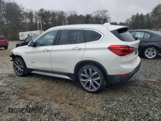 2017 BMW X1 xDrive28i with VIN WBXHT3C38H5F70088, listed as a Copart auction lot 50447715 with 119,649 mi miles and Clean Title. Bid and sale history available at carsss.com. Image 2.