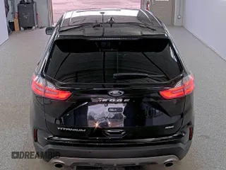 2021 Ford Edge Titanium z VIN 2FMPK4K99MBA51606, wystawiony jako IAAI lot #42409036 z przebiegiem 37 233 mil mil oraz . Historia ofert i sprzedaży dostępna na DreamBid. Obrazek 1.