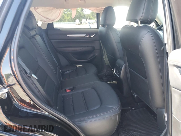 2023 Mazda CX-5 S Carbon Edition z VIN JM3KFBCM3P0264493, wystawiony jako Copart lot #52118475 z przebiegiem 3 195 mil mil oraz Szkoda całkowita • Salvage title. Historia ofert i sprzedaży dostępna na DreamBid. Obrazek 11.