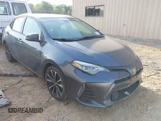 2018 Toyota Corolla L with VIN 5YFBURHE8JP817984, listed as a IAAI auction lot 42158277 with 87,401 mi miles and . Bid and sale history available at DreamBid. Image 1.