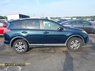 2017 Toyota RAV4 LE with VIN JTMZFREV4HJ136104, listed as a IAAI auction lot 42077699 with 120,360 mi miles and . Bid and sale history available at carsss.com. Image 13.
