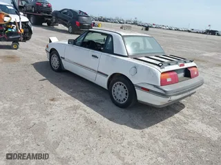1991 Mercury Capri with VIN 6MPCT01ZXM8629590, listed as a IAAI auction lot 41821813 with 162,781 mi miles. Bid and sale history available at carsss.com. Image 3.