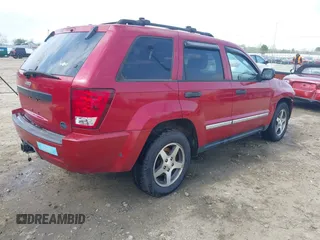 2005 Jeep Grand Cherokee Laredo with VIN 1J4HS48N95C711992, listed as a IAAI auction lot 41944696 with 209,299 mi miles and . Bid and sale history available at DreamBid. Image 4.