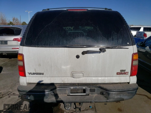 2003 GMC Yukon SLE with VIN 1GKEK13Z13R249251, listed as a Copart auction lot 88695635 with 189,129 mi miles and Salvage Title. Bid and sale history available at carsss.com. Image 6.