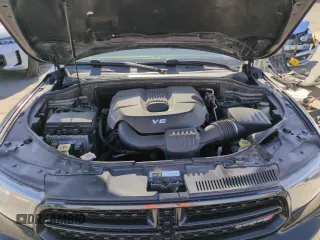 2015 Dodge Durango SXT with VIN 1C4RDHAG6FC850065, listed as a Copart auction lot 57144295 with 243,646 mi miles and Salvage title. Bid and sale history available at DreamBid. Image 12.