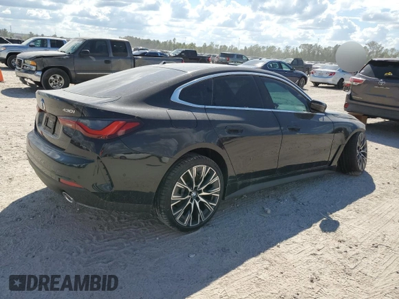 2024 BMW 4 Series 430i with VIN WBA63AV06RFR10405, listed as a Copart auction lot 74097404 with Not Provided miles and Salvage Title. Bid and sale history available at DreamBid. Image 3.