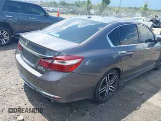2017 Honda Accord Touring with VIN 1HGCR3F98HA015928, listed as a IAAI auction lot 42553437 with 168,902 mi miles and . Bid and sale history available at DreamBid. Image 4.