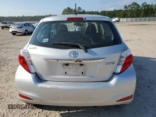 2014 Toyota Yaris L with VIN VNKJTUD30EA006137, listed as a Copart auction lot 72061304 with 104,664 mi miles and Salvage Title. Bid and sale history available at carsss.com. Image 6.