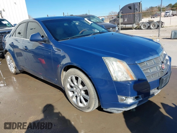 2009 Cadillac CTS RWD with VIN 1G6DV57V990146995, listed as a IAAI auction lot 41209631 with 172,229 mi miles and . Bid and sale history available at carsss.com. Image 1.