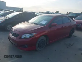 2010 Toyota Corolla with VIN 1NXBU4EE5AZ261543, listed as a IAAI auction lot 42214774 with 179,539 mi miles and . Bid and sale history available at carsss.com. Image 2.