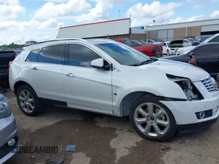 2015 Cadillac SRX Premium Collection with VIN 3GYFNDE37FS627697, listed as a IAAI auction lot 42354811 with 64,135 mi miles and . Bid and sale history available at DreamBid. Image 14.
