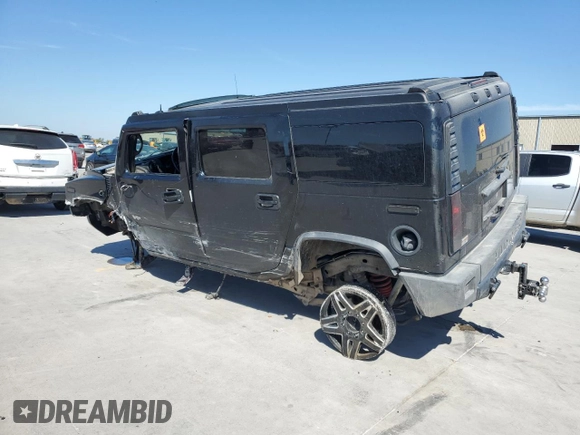 2005 Hummer H2 SUV with VIN 5GRGN23U95H101796, listed as a Copart auction lot 76991574 with 88,204 mi miles and Salvage Title. Bid and sale history available at carsss.com. Image 2.