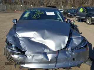 2025 Tesla Model 3 Long Range z VIN 5YJ3E1EA1SF877574, wystawiony jako IAAI lot #41891632 z przebiegiem 2 914 mil mil oraz . Historia ofert i sprzedaży dostępna na DreamBid. Obrazek 11.