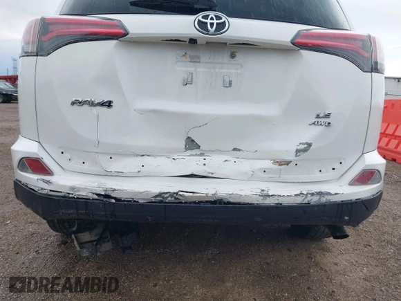 2018 Toyota RAV4 LE with VIN JTMBFREV8JJ722277, listed as a IAAI auction lot 42075684 with 203,458 mi miles and . Bid and sale history available at DreamBid. Image 17.