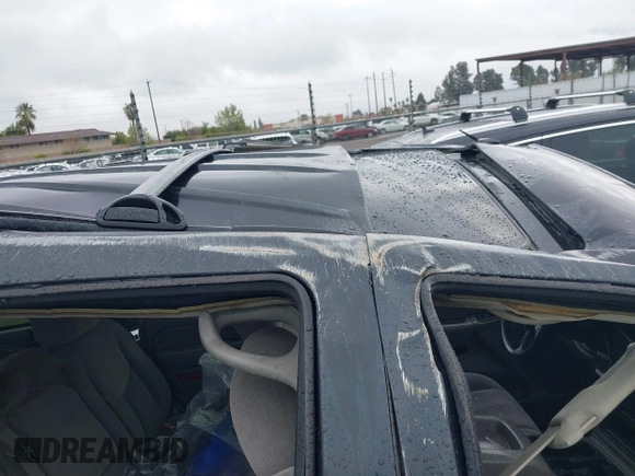 2005 Chevrolet Tahoe Z71 with VIN 1GNEC13T15R205653, listed as a IAAI auction lot 41808672 with 210,261 mi miles and . Bid and sale history available at DreamBid. Image 14.