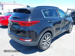2019 Kia Sportage EX with VIN KNDPN3AC2K7602435, listed as a IAAI auction lot 42233427 with 58,730 mi miles and . Bid and sale history available at DreamBid. Image 4.