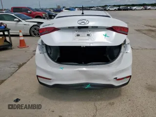 2021 Hyundai Accent SE z VIN 3KPC24A62ME132613, wystawiony jako Copart lot #57827625 z przebiegiem 81 404 mil mil oraz Szkoda całkowita • Salvage title. Historia ofert i sprzedaży dostępna na DreamBid. Obrazek 6.