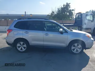 2014 Subaru Forester Premium with VIN JF2SJAEC5EH551632, listed as a IAAI auction lot 42640444 with 240,591 mi miles and . Bid and sale history available at DreamBid. Image 13.