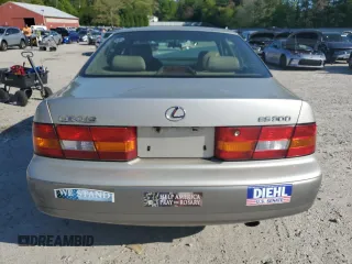 1998 Lexus ES 300 z VIN JT8BF28G5W0086627, wystawiony jako Copart lot #56021985 z przebiegiem 244 405 mil mil oraz Czysty tytuł • Clean title. Historia ofert i sprzedaży dostępna na DreamBid. Obrazek 6.