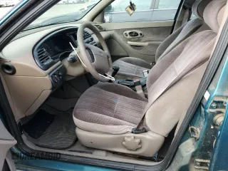 1997 Ford Contour z VIN 3FALP6536VM113346, wystawiony jako Copart lot #70036024 z przebiegiem 115 084 mil mil oraz Tytuł czysty. Historia ofert i sprzedaży dostępna na DreamBid. Obrazek 7.