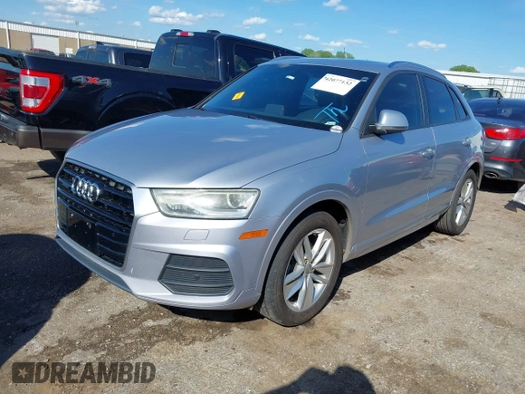 2017 Audi Q3 Premium with VIN WA1ECCFSXHR002623, listed as a IAAI auction lot 42077132 with 118,511 mi miles and . Bid and sale history available at DreamBid. Image 2.