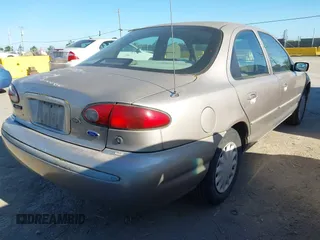 1995 Ford Contour LX z VIN 1FALP6536SK194464, wystawiony jako IAAI lot #42305265 z przebiegiem 217 353 mil mil oraz . Historia ofert i sprzedaży dostępna na DreamBid. Obrazek 4.