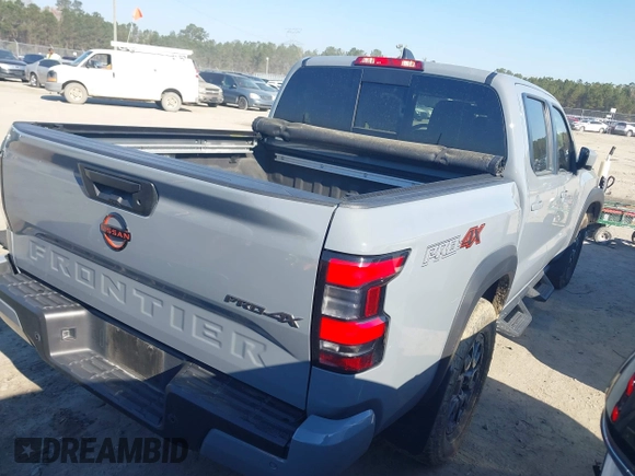 2023 Nissan Frontier Pro-4X with VIN 1N6ED1EK7PN604374, listed as a IAAI auction lot 41828936 with 60,452 mi miles and . Bid and sale history available at DreamBid. Image 4.