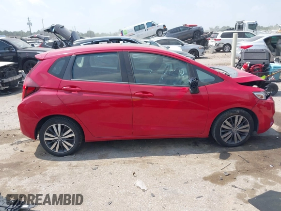 2015 Honda Fit EX-L z VIN 3HGGK5H86FM719146, wystawiony jako IAAI lot #42276633 z przebiegiem 155 515 mil mil oraz . Historia ofert i sprzedaży dostępna na DreamBid. Obrazek 13.