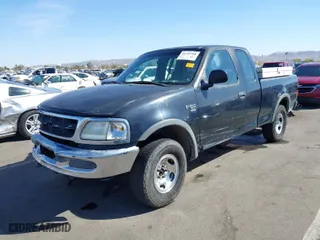 1998 Ford F-150 Standard with VIN 1FTZX18W1WNB51510, listed as a IAAI auction lot 41725588 with 223,158 mi miles. Bid and sale history available at carsss.com. Image 2.
